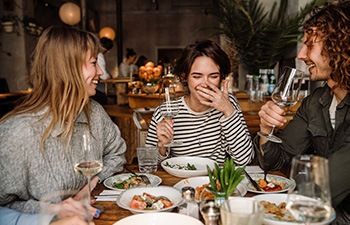 Group of friends enjoying dinner together