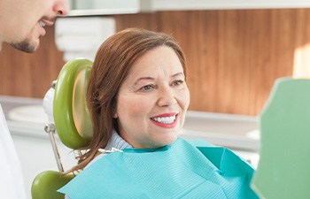 Woman smiling in the dental chair