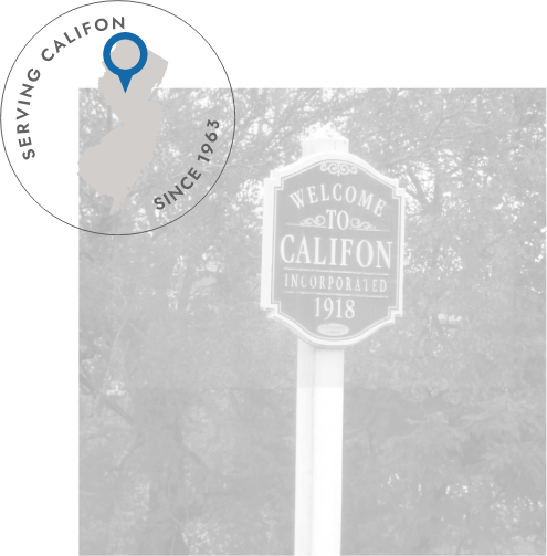 Welcome to Califon sign next to stamp reading serving Califon since 1963